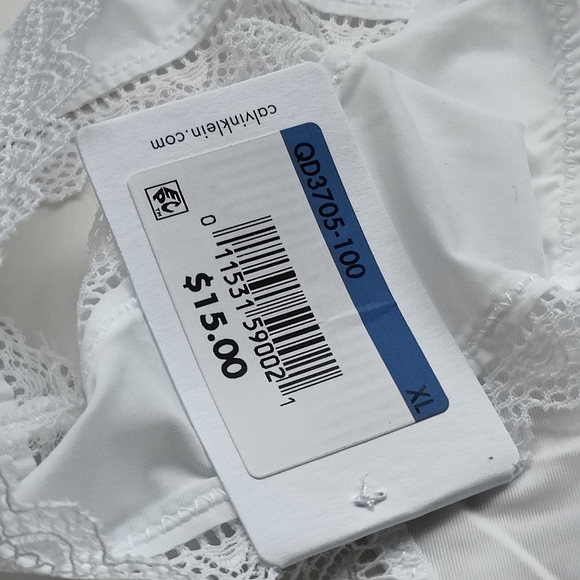 NWT CALVIN KLEIN FLIRTY MICRO THONG PANTY IN WHITE SIZE EXTRA LARGE - Picture 4 of 5